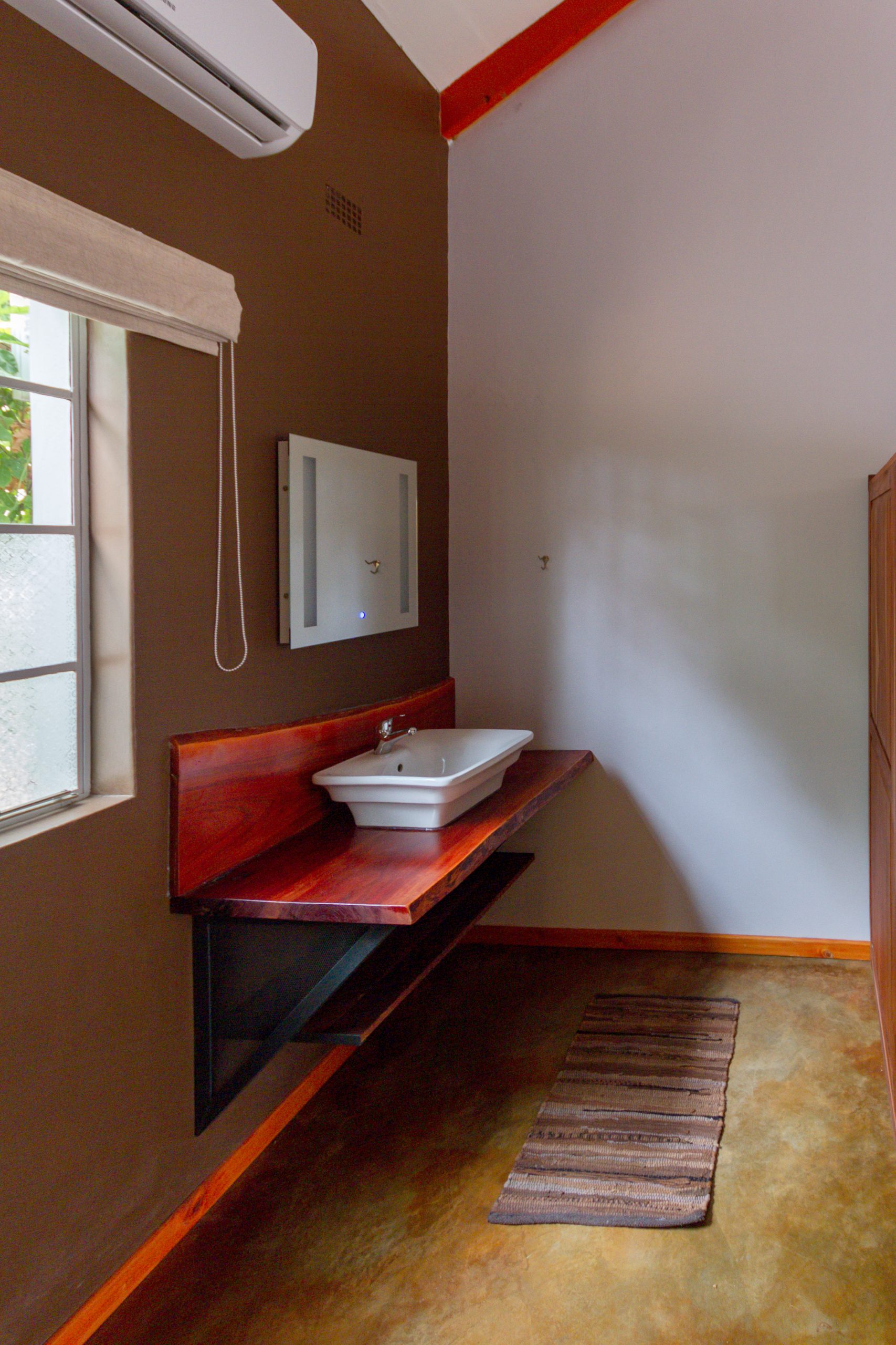 The vanity area of room 8 at The Courtney Lodge